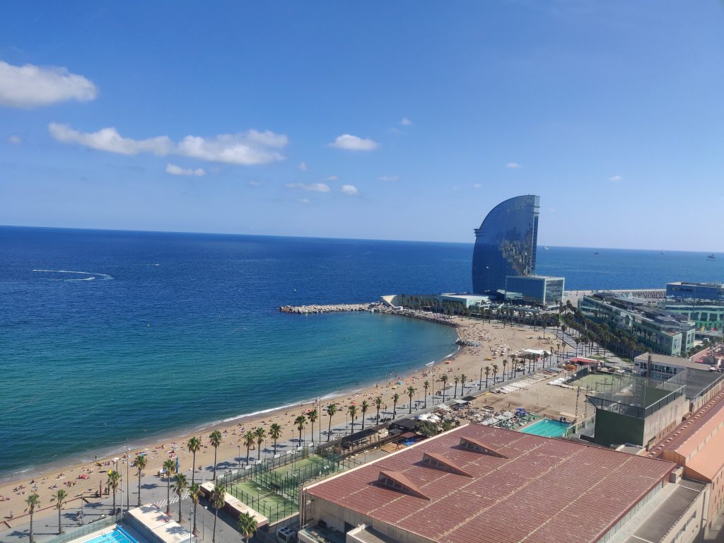 A view of Barcelona Beach with the W hotel in the background